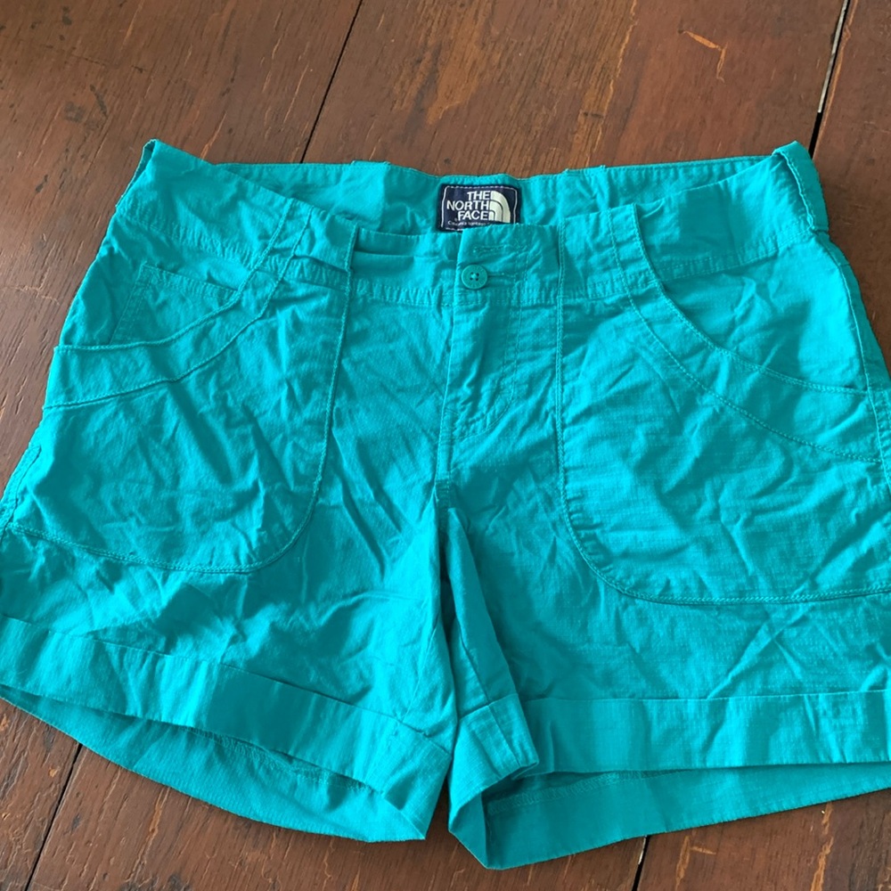 The North Face turquoise shorts gently used